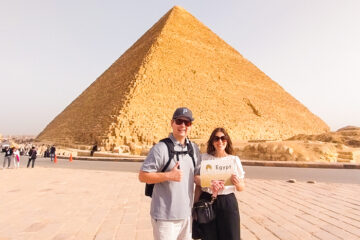 A picture of a couple of our visitors in front of pyramid of Menkara