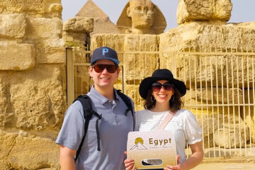 A picture of a couple of our visitors in front of the Great Sphinx in Giza